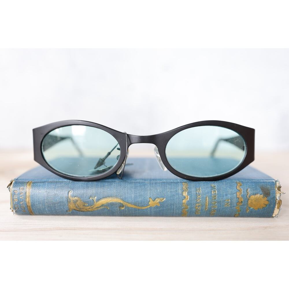 Vintage sunglasses 1990s cat eye Grunge era Goth alternative All metal Eyewear